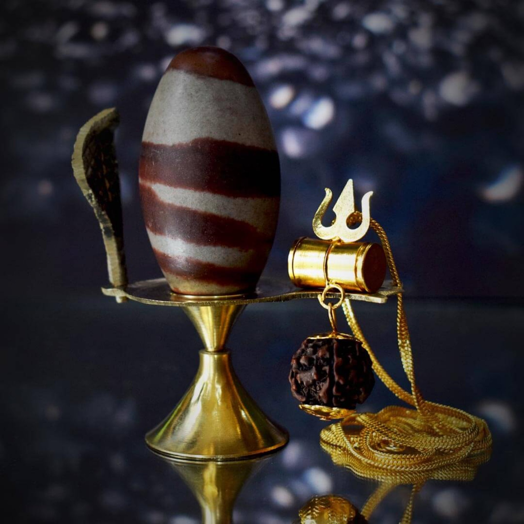 Narmadeshwar Shivling With Brass Base And Mahakal Kavach Online